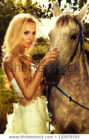 Attractive Blonde Woman Posing With Horse Stock foto © PawelSierakowski