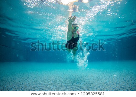 Stock photo: Sportive Girl In Swimming Pool