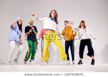 Сток-фото: Young Black Woman Is Jumping In The Middle Of The Street