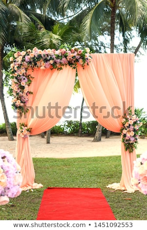 Stok fotoğraf: Arch For The Wedding Ceremony Decorated With Cloth And Flowers