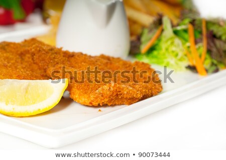 Classic Milanese Veal Cutlets And Vegetables Foto stock © keko64
