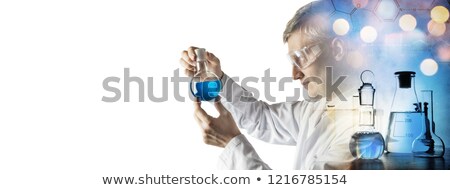 Zdjęcia stock: Isolated Scientist Conducting An Experiment In A Lab