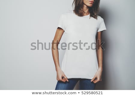 Foto stock: Beautiful Young Girl Wearing Shirt Fashion On Grey