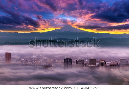 Stock photo: Dramatic Sunrise Over Foggy Downtown Portland