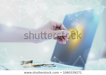 Stock photo: Hands With Cryptocurrency On Laptop Screen