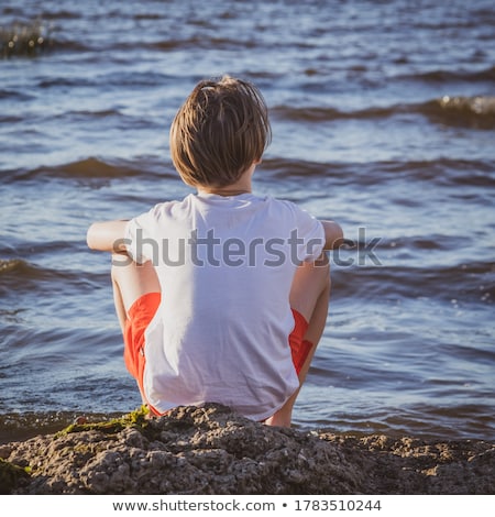 Foto stock: Outdoor Portrait Of Relaxed Cute Young Boy