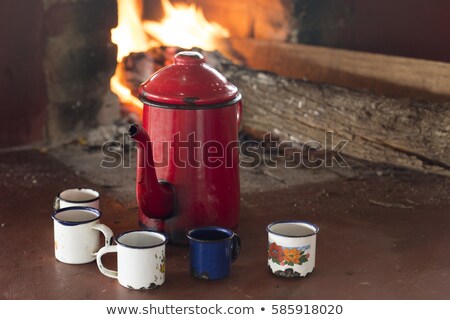 Stockfoto: Enamel Cup Of Coffee