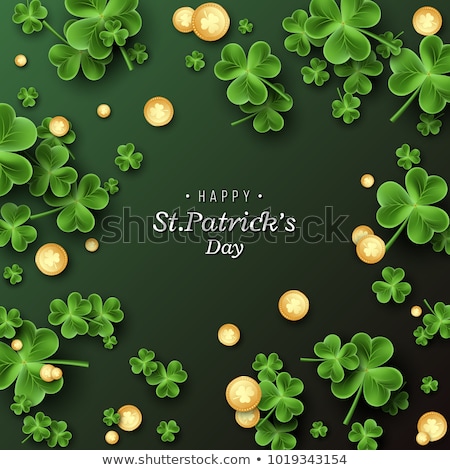 Foto stock: Clover Leaves With Golden Coins St Patricks Background