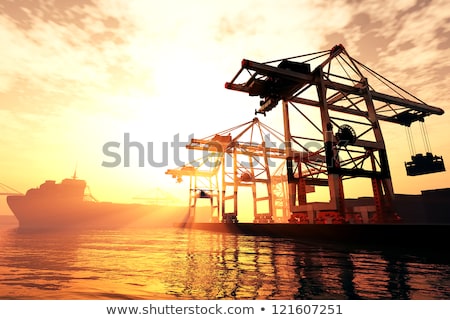 Stockfoto: Industrial Harbor At Sunset And A Crane