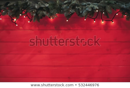 Foto d'archivio: Colorful Bulb Garland With Red Background