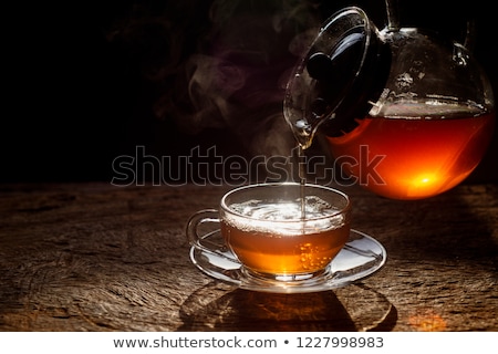 Foto stock: Closeup Of Hot Water Being Poured Out Of The Kettle