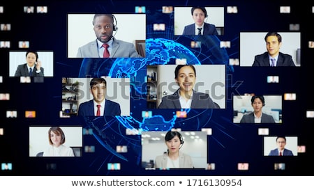 Stock fotó: Businessman And Businesswoman With Virtual Earth
