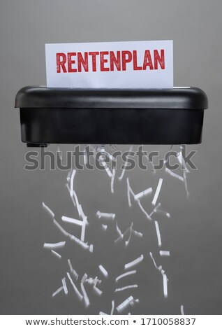 Foto d'archivio: A Shredder Destroying A Document - Pension Plan