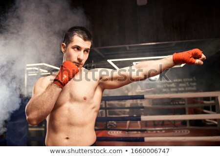 Foto stock: Muscle Boxer Shaped Man Fist To Camera