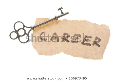 Antique Brass Key On Old Script Foto d'archivio © Raywoo