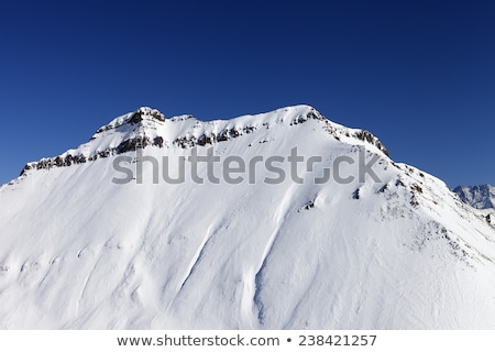 Snowy Rocks With Traces From Avalanche Сток-фото © Lizard