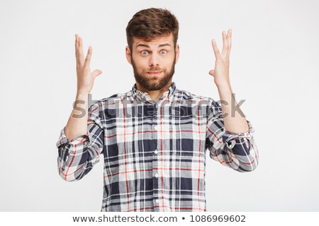 Zdjęcia stock: Desperate Upset Man In Plaid Shirt With Hands Over Head