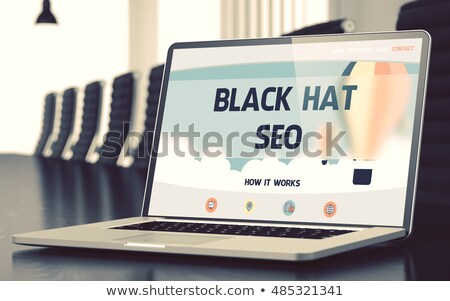 ストックフォト: Black Hat Seo On Laptop In Conference Room 3d