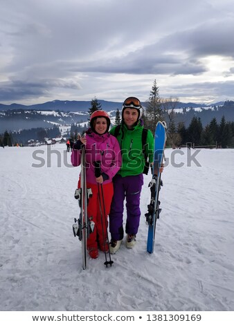 Foto stock: Skiers Playing Piggyback Ride