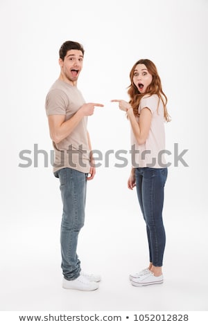 Stockfoto: Full Length Image Of Optimistic Man And Woman In Casual Wear Lau