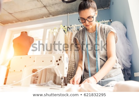 Foto stock: Tailor Working In Atelier