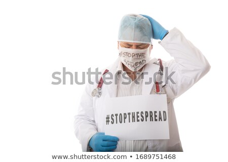 Stockfoto: Overwhelmed Doctor Advising To Stop The Spread Of Infectious Vir