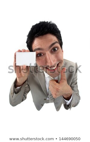 Zdjęcia stock: Grinning Man Holding Up His Business Card