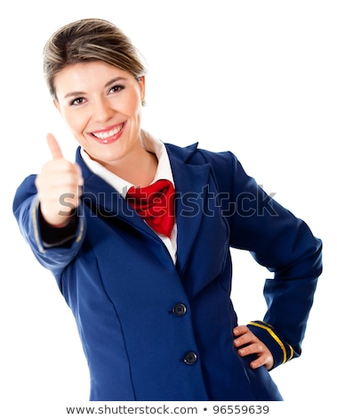 Stok fotoğraf: Woman Flight Attendant With Thumb Up Gesture