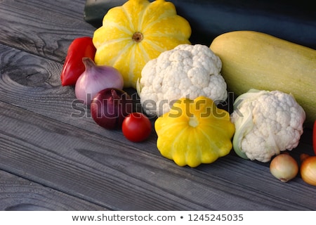 Foto d'archivio: Fresh Organic Flowers Of Zucchini On A Wooden Table Rustic St