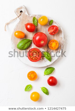 Zdjęcia stock: Organic Mini Tomatoes With Basil And Pepper On Stone Kitchen Background San Marzano Orange And Che