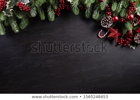 Stockfoto: Spruce Branches Golden Cones And Red Stars