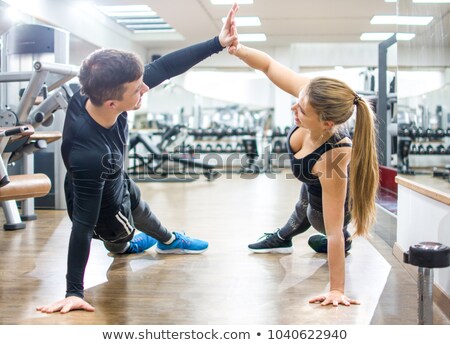Сток-фото: Woman And Man Giving High Five While Doing Fitness Sport