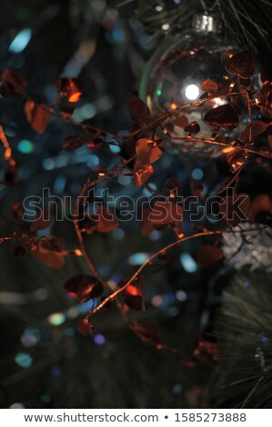 Stock photo: Pretty Dog With A Red Tinsel Star