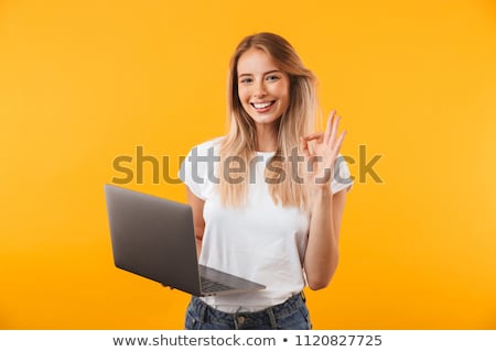 Foto d'archivio: Attractive Blonde Girl With Laptop