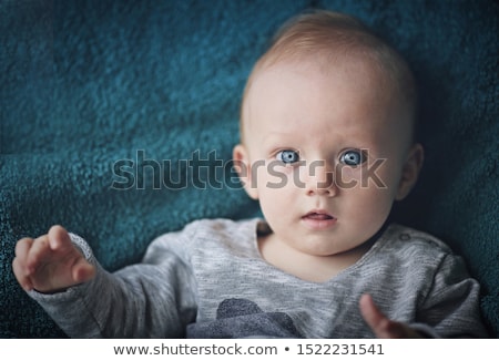 Zdjęcia stock: Portrait Of Sad Baby Boy On Green Background