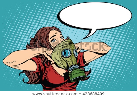 Stockfoto: Civil Defence Girl Wears A Protective Gas Mask