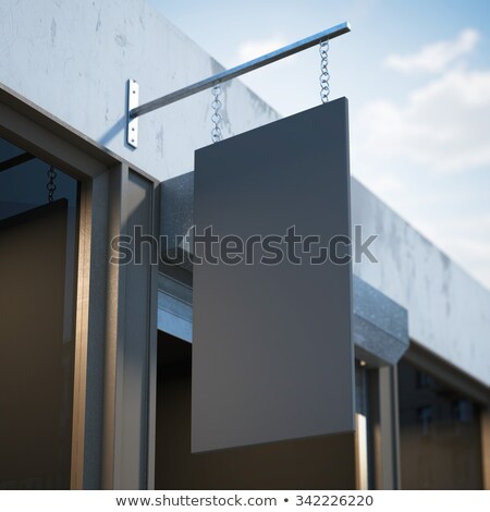 Stok fotoğraf: Black Blank Signboard Hanging Near Shop Door