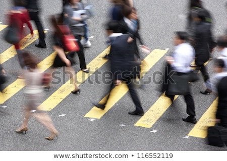 [[stock_photo]]: Businessman Crossing The Road In A Hurry