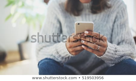 Foto d'archivio: Woman On Phone In Sunny Home Office