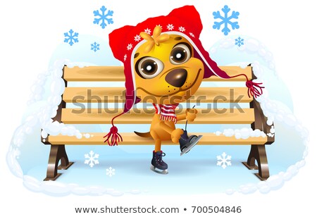 Foto stock: Yellow Dog Puts On Skates Winter Vacation