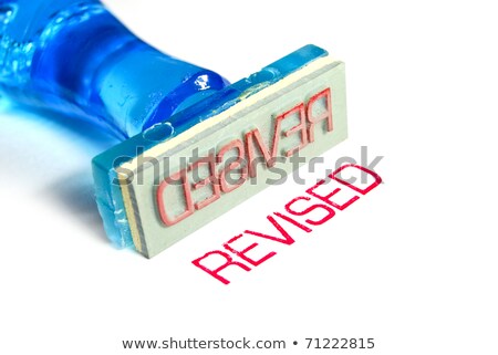 Stock fotó: A Red Stamp On A Document - Revision