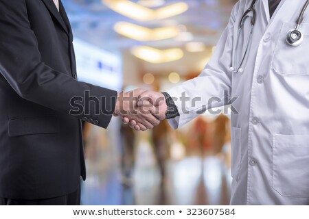 Foto stock: Handshake Between Businessmen