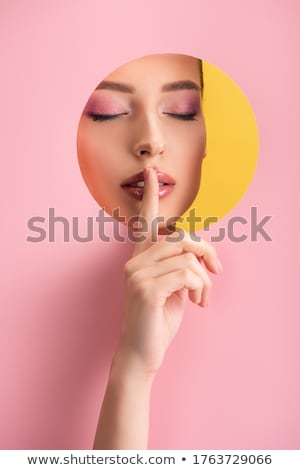 Stock fotó: Beautiful Young Woman Showing Silence Gesture