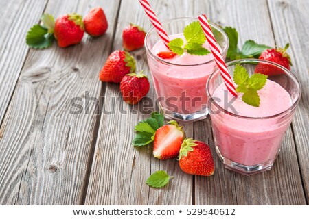 Foto stock: Two Glasses Of Strawberry Shake