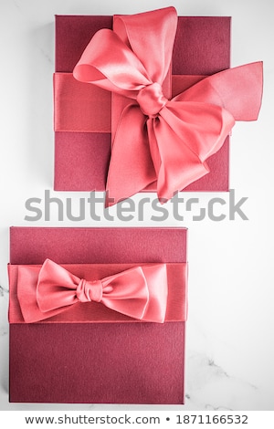 Stok fotoğraf: Coral Silk Ribbon And Bow On Marble Background Girl Baby Shower