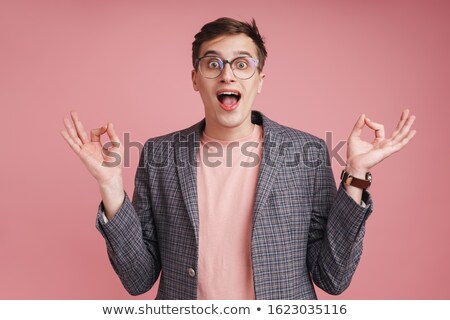Foto stock: Shocked Boy In Glasses Make Meditate Gesture