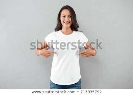 Stok fotoğraf: Woman In Blank White T Shirt Pointing Her Finger