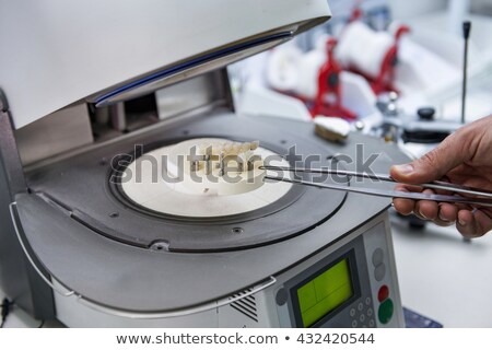 [[stock_photo]]: One Pressed Ceramic Tooth