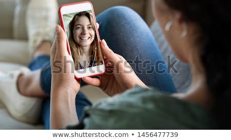 Foto stock: Woman Calling By Mobile Phone