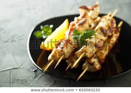 Foto stock: Rochetas · de · pollo · a · la · barbacoa